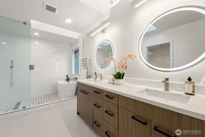Stunning primary bath with anti-fog mirrors