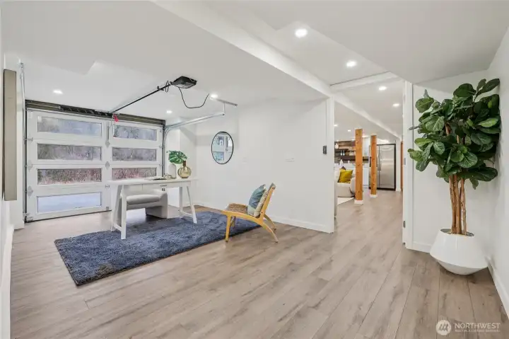 Lower level rec room with garage door for easy backyard access