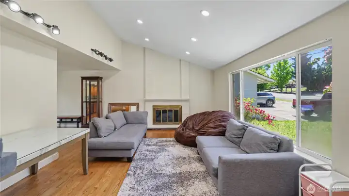 Spacious living room filled with natural light.