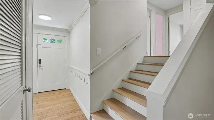 Looking back at the entry. Stairs up lead to the bedrooms.
