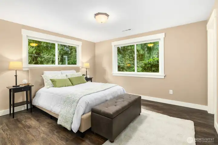 Generous primary bedroom with en suite bath. Each bedroom has California Closet organizers.
