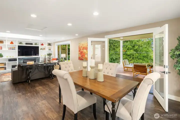 Adjacent to the living area are French doors that lead to the partially covered composite deck.