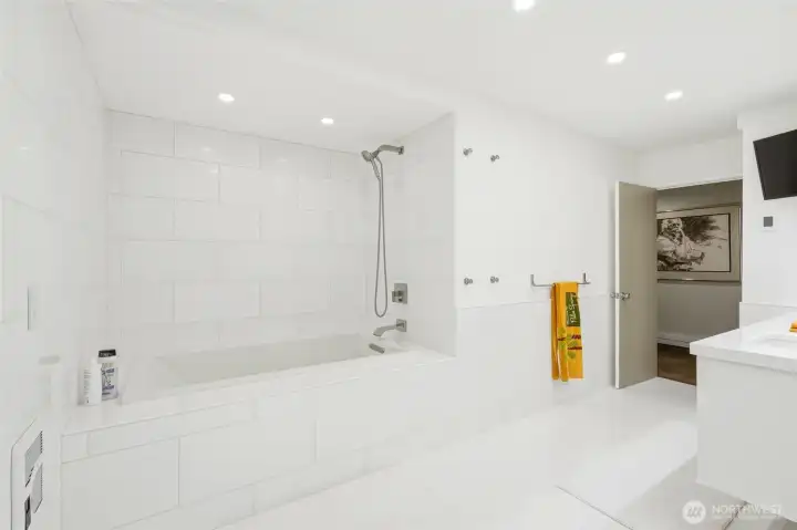 Fully remodeled bathroom on the main floor serves bedroom and office/4th bedroom on main floor.