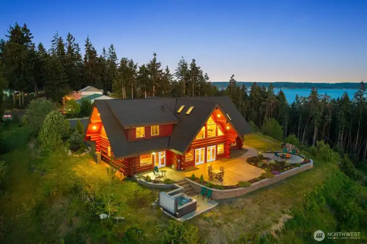 Custom Log Home with VIEWS! Stunning details throughout.  Massive stamped concrete patio with a fabulous fire pit