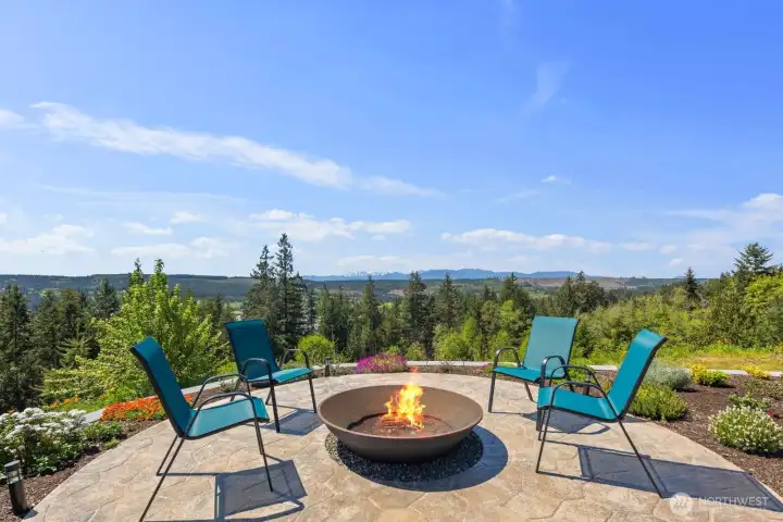 Enjoy the expansive views from the luxurious firepit area