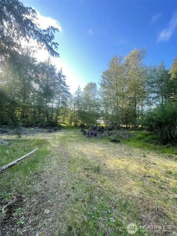 The trail driveway keeps going into a charming retreat/picnic area.