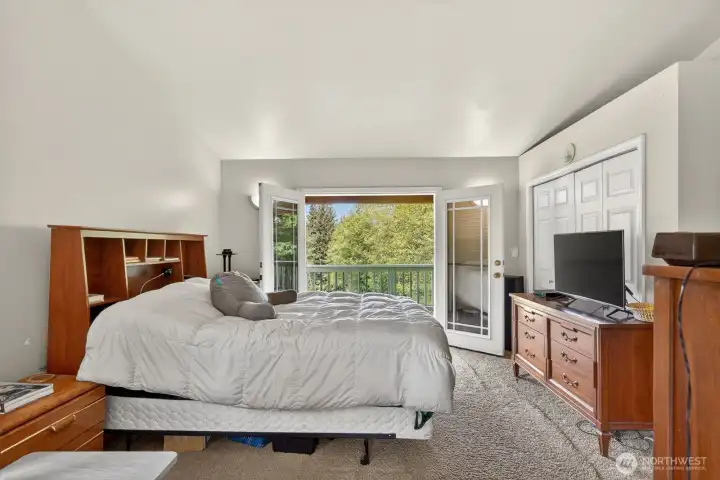 Primary Suite with French doors out to large balcony. Primary Suite with French doors out to large balcony.
