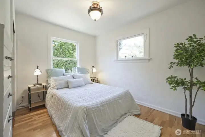 Bedroom on main floor, adjacent to bathroom has Cedar lined closet & built-in dresser drawers