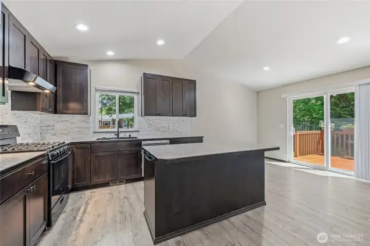 Eat-in kitchen, sliders to deck