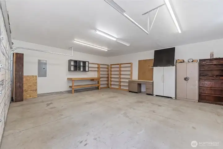 Detached 2-car garage/workshop: 720 sq ft., sellers currently have personal property stored here that will be cleared