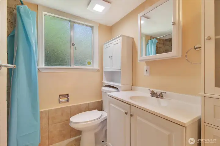 Brand new toilet, mirror and vanity with sink Brand new toilet, mirror and vanity with sink