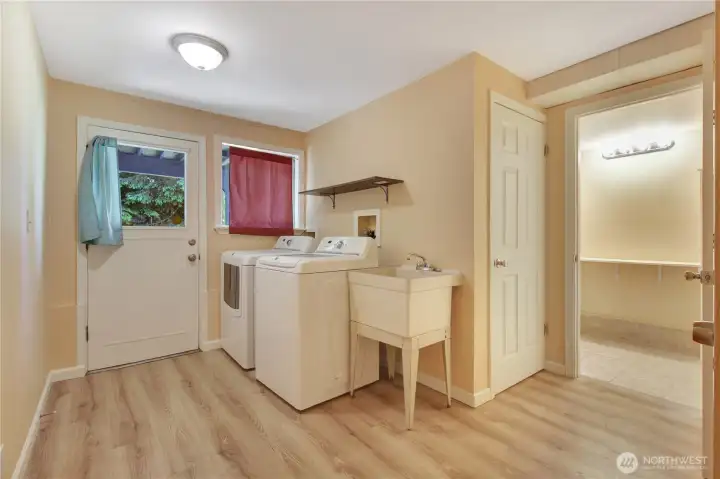 Mudroom with washer/dryer, storage space under stairs. Mudroom with washer/dryer, storage space under stairs.