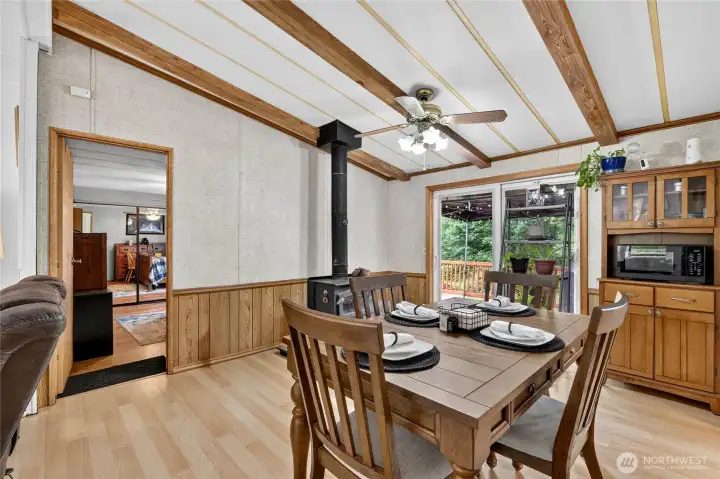 Formal Dining Room with Woodstove and Sliding Doors to Back Deck