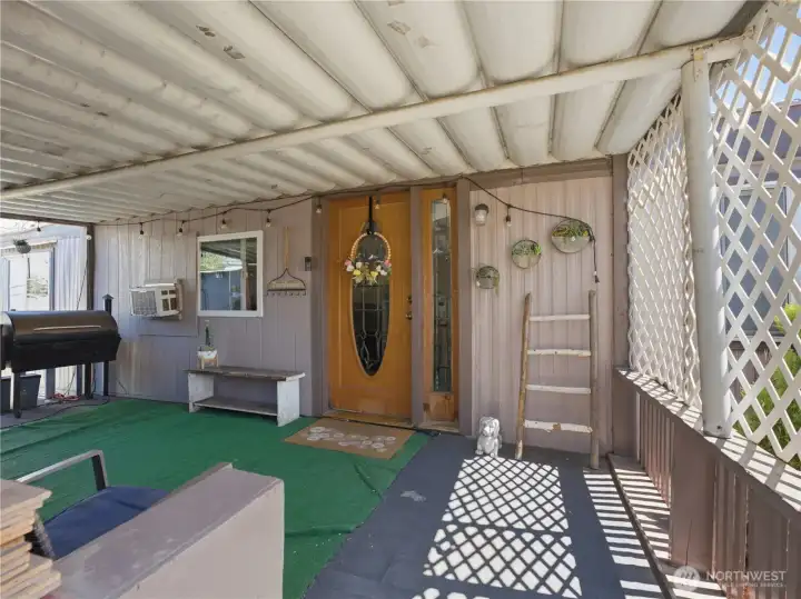 Large covered front porch perfect for outdoor relaxation and entertaining. Large covered front porch perfect for outdoor relaxation and entertaining.