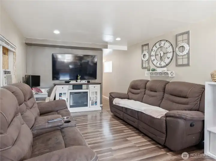 Living room with open layout connecting seamlessly to the kitchen. Living room with open layout connecting seamlessly to the kitchen.