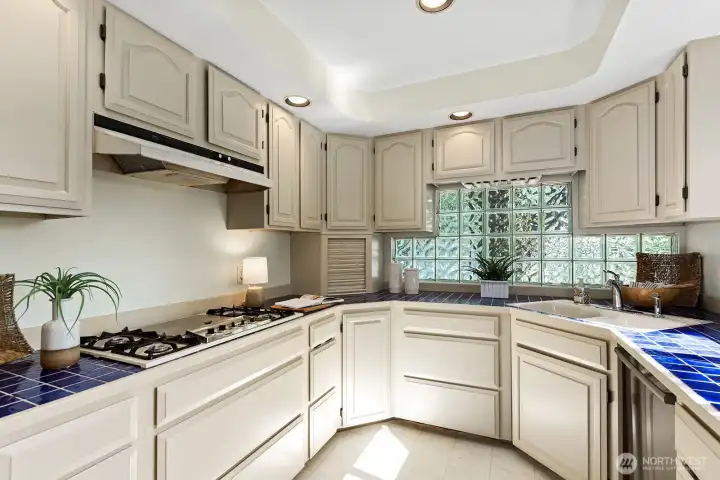Very functional and a little bit vintage. This kitchen could be opened to the dining area to capture views.