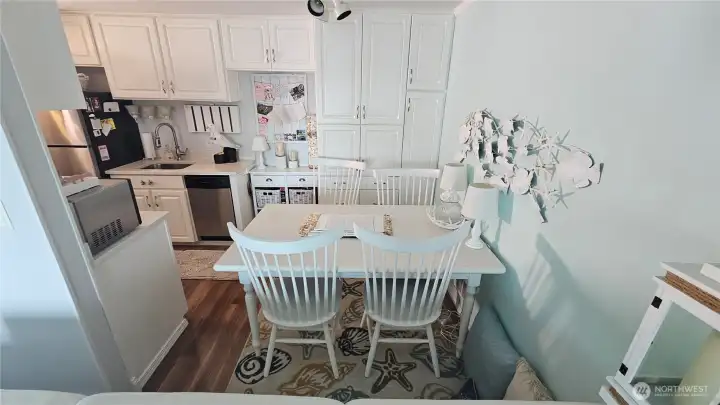 Dining area between Galley kitchen and living room