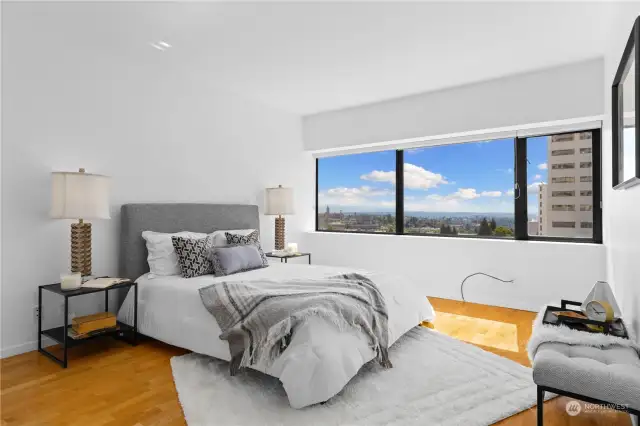 Primary bedroom has incredible southern views, hardwood floors and was just painted.