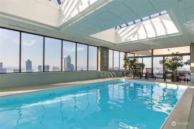 Building features an indoor pool by the gym.