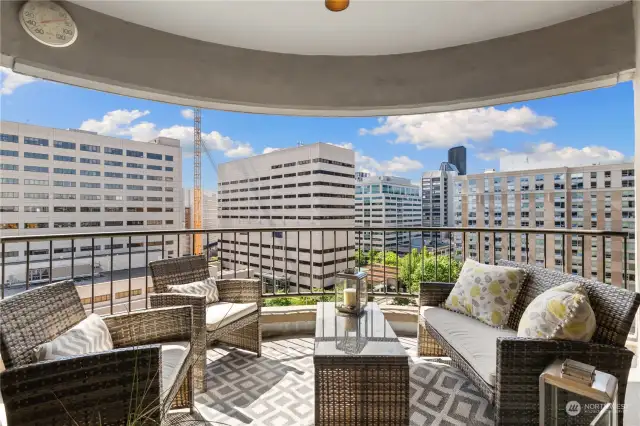 Enjoy the spacious covered balcony with epic City views.