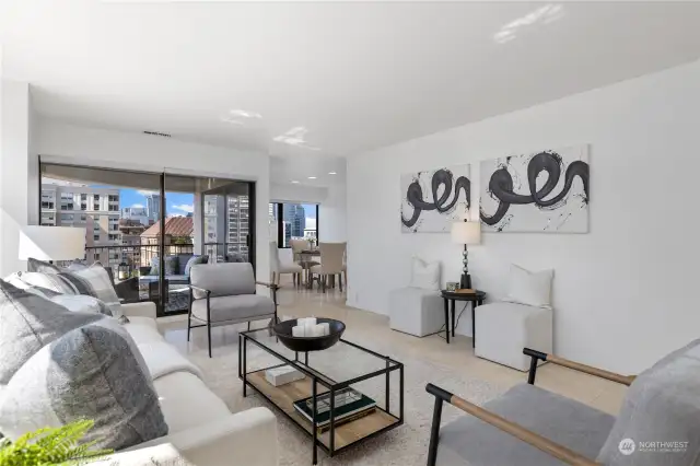 The main living room is very large and flows out to the balcony. Marble floors and freshly painted.