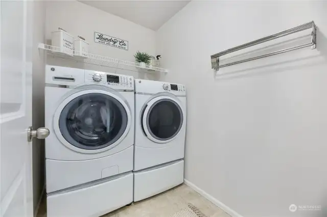 Laundry room with pedestal washer and dryer