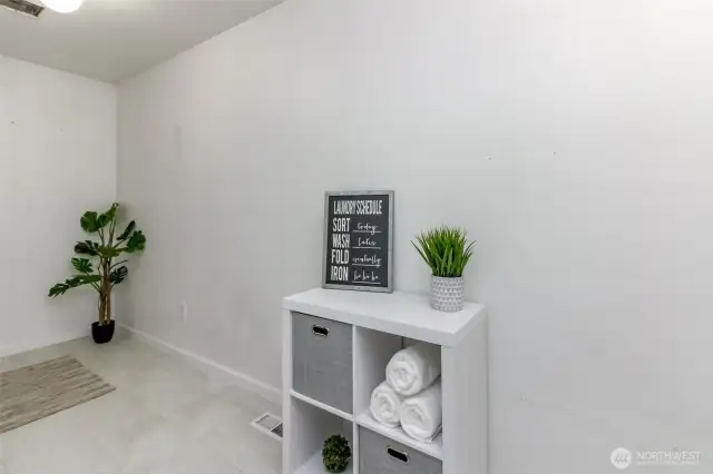 Utility room with new laminate tile.