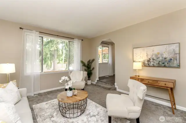 The large windows face the backyard.
