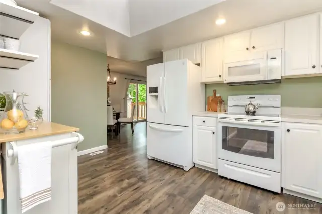 The kitchen also opens to the dining room and family room.