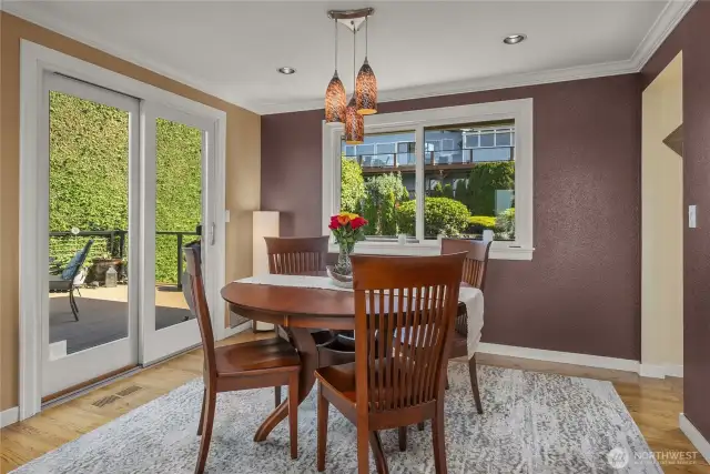 As you can see, this Dining Room space will accommodate a larger table when/if needed, and offers a seamless connection to the deck for indoor-outdoor living and entertaining.