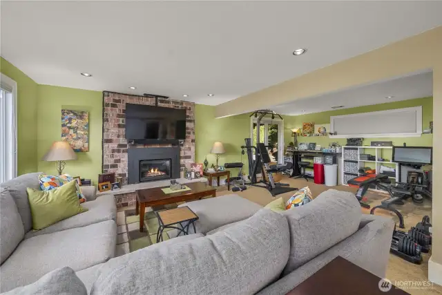 To the right of this photo is another area of the Family room, currently being used as a Multipurpose Art and Exercise area. This Family Room is a truly a Multi-functional, Versatile Space.