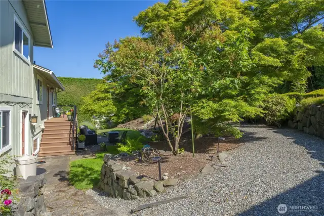 With Mature Trees, Plants and Shrubberies, this wonderful yard offers a Green Canopy and a park-like setting. It’s very quiet and relaxation.