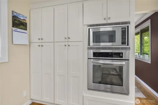 Well-appointed with Cabinetry Galore, this Gourmet Kitchen allows for Excellent Organization of your Culinary Tools and Ingredients! Pictured here on the left are 2 Pantry Cabinets with Pull-Out Shelves.