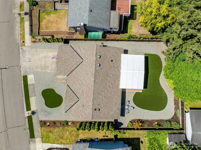 From curb to fence line, this property boasts immaculate, low-maintenance landscaping with manicured garden beds, sleek turf accents, and a fully fenced backyard designed for comfort and ease.