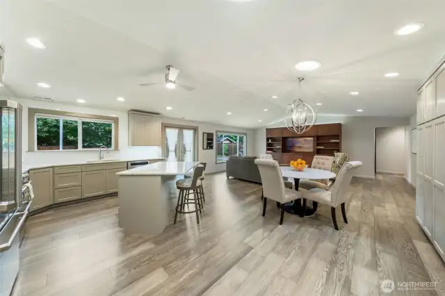 You're immediately embraced by an effortless flow of space from the kitchen. Be sure to admire the kitchen island – its clever and functional storage solutions are a must-see!