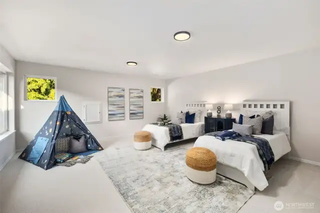 Expansive and flexible, this oversized fourth bedroom offers endless possibilities—whether you need a shared room, hobby space, home gym, or play area. Fresh carpet and updated lighting make it a welcoming, move-in ready retreat.