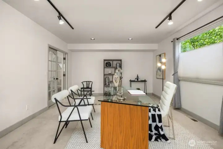 Large office close to the front door has a private deck. (1of 3)