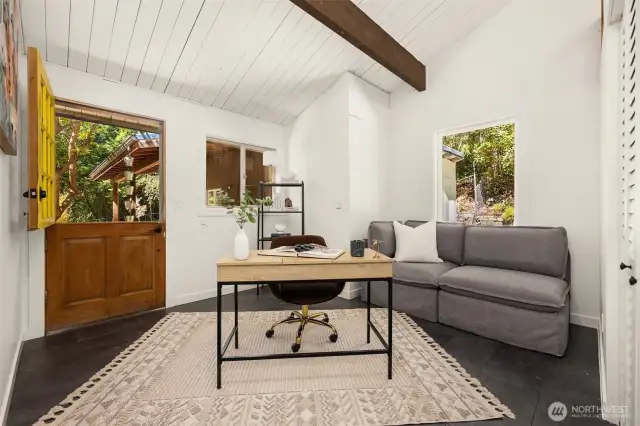 Back office off of the garage that was converted into living space.  The sweet dutch door opens up to the fenced back yard with garden space and fruit trees.