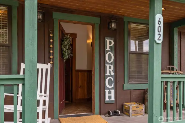 The cutest front porch, entry way.