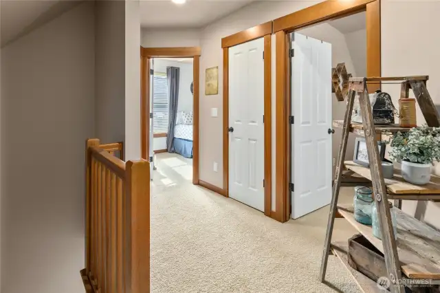 Landing upstairs leading to two bedrooms and a bathroom.