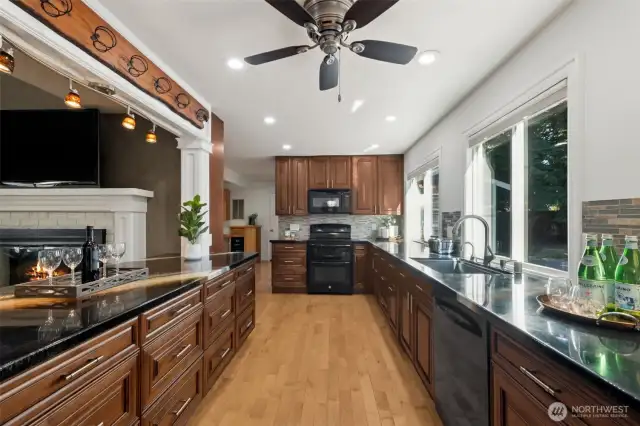 Gorgeous updated kitchen! Includes ceiling fan, open passthrough to the living room.