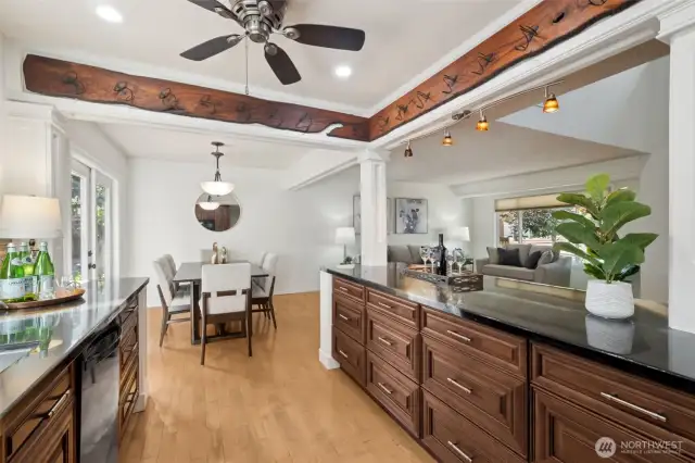 The custom wine bottle rack at the ceiling was designed for the space and it stays!