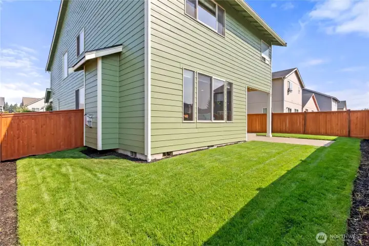 New fully fenced yard with new sod, new landscaping and front/back sprinkler system.