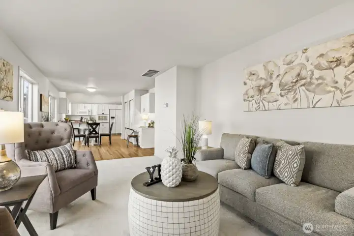 Spacious family room with gas fireplace and views into the backyard.