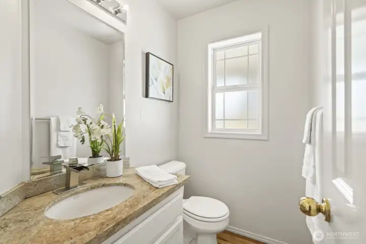 Inviting main floor half bath.