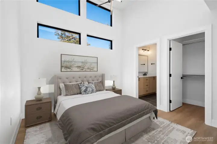 Primary Suite *From 220. Photo has been virtually staged and may be an angle from an adjacent unit.