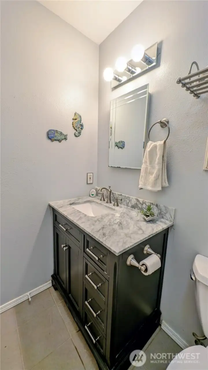 2nd bathroom with marble countertop