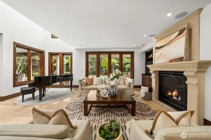 A light-filled living room defined by a dramatic skylight and clean architectural lines.