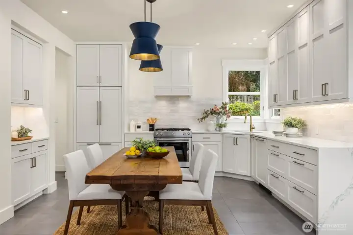 Undermount lighting and all new Mortise & Tenon cabinetry for this totally remodeled kitchen.