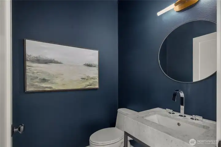 A marble vanity top in the  main floor powder room.